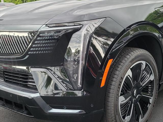 Photo of 2025 Black Raven Cadillac Escalade IQ