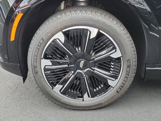 Photo of 2025 Black Raven Cadillac Escalade IQ