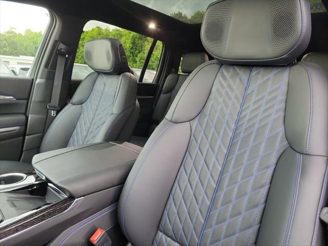 Photo of 2025 Black Raven Cadillac Escalade IQ