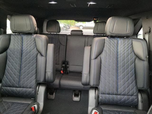 Photo of 2025 Black Raven Cadillac Escalade IQ