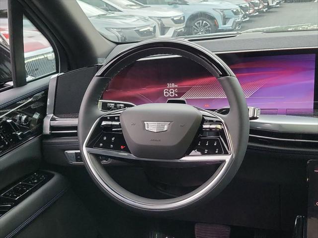 Photo of 2025 Black Raven Cadillac Escalade IQ