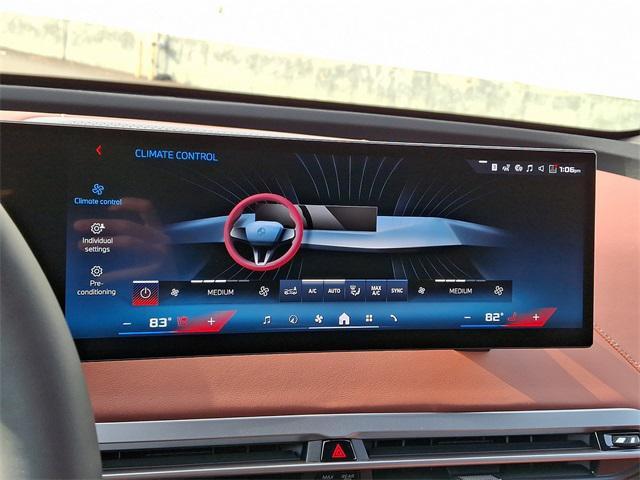 Photo of 2025 Black Sapphire Metallic BMW iX