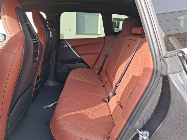 Photo of 2025 Black Sapphire Metallic BMW iX