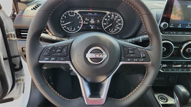 Photo of 2025 Aspen White Tricoat/Super Black Nissan Sentra