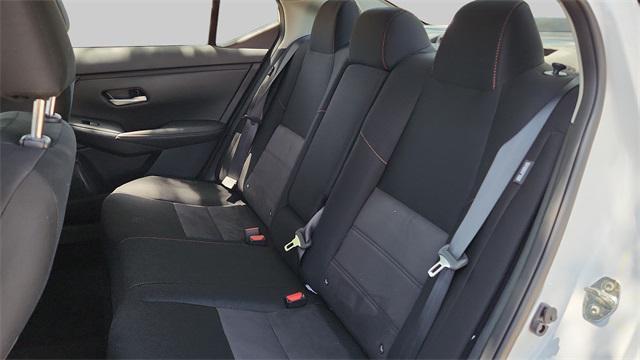 Photo of 2025 Aspen White Tricoat/Super Black Nissan Sentra