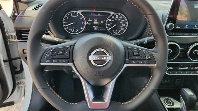 Photo of 2025 Aspen White Tricoat/Super Black Nissan Sentra