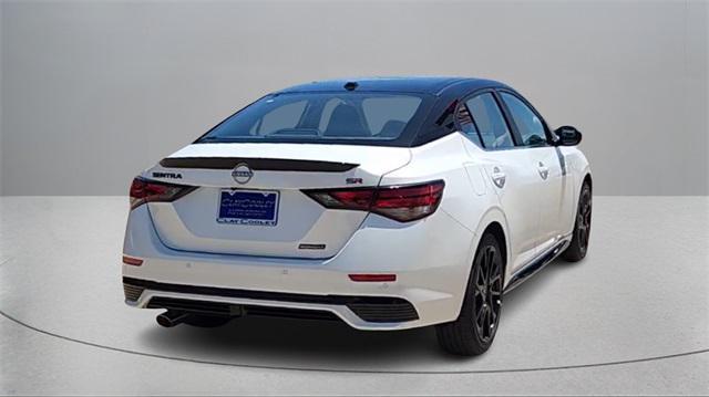 Photo of 2025 Aspen White Tricoat/Super Black Nissan Sentra