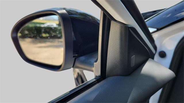 Photo of 2025 Aspen White Tricoat/Super Black Nissan Sentra