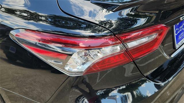 Photo of 2024 Midnight Black Metallic Toyota Camry