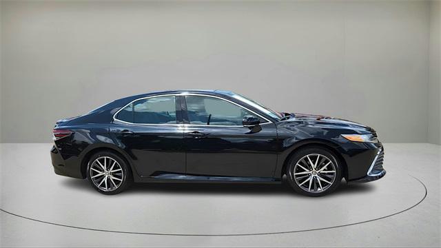 Photo of 2024 Midnight Black Metallic Toyota Camry