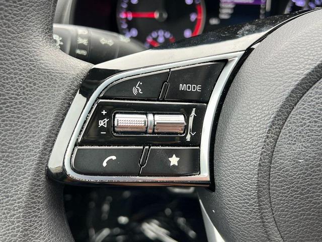 Photo of 2022 Fire Orange Kia Forte