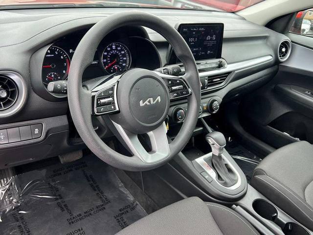 Photo of 2022 Fire Orange Kia Forte