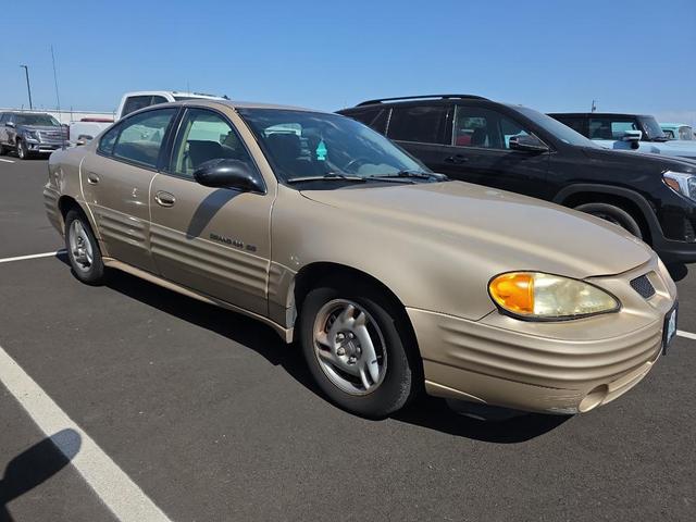 Photo of 2002 Champagne Beige Metallic Pontiac Grand Am