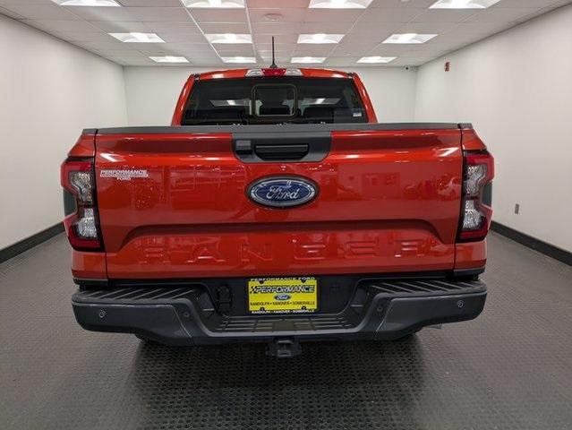 Photo of 2024 Hot Pepper Red Metallic Tinted Clearcoat Ford Ranger