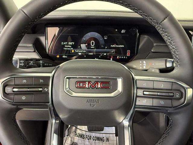 Photo of 2025 Volcanic Red GMC Acadia