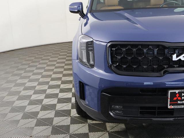 Photo of 2024 Midnight Lake Blue Kia Telluride