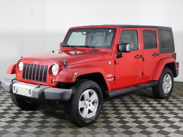 Photo of 2010 Flame Red Clearcoat Jeep Wrangler Unlimited
