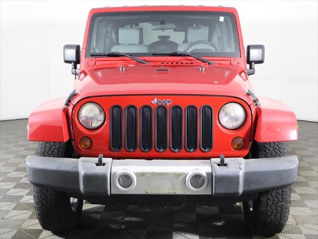 Photo of 2010 Flame Red Clearcoat Jeep Wrangler Unlimited