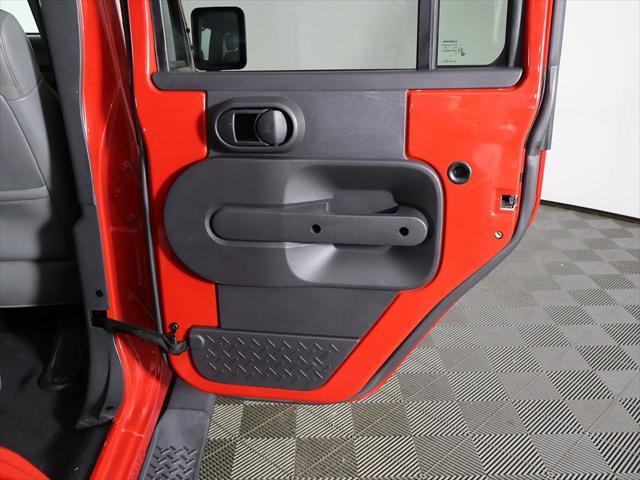 Photo of 2010 Flame Red Clearcoat Jeep Wrangler Unlimited