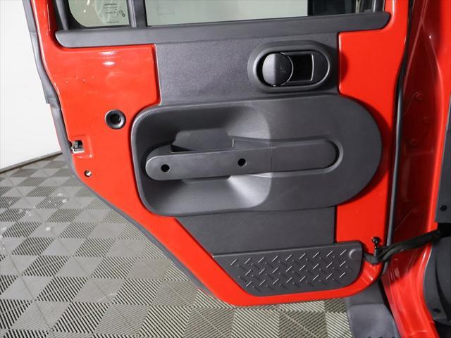 Photo of 2010 Flame Red Clearcoat Jeep Wrangler Unlimited