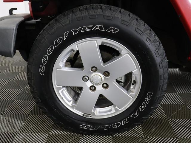 Photo of 2010 Flame Red Clearcoat Jeep Wrangler Unlimited