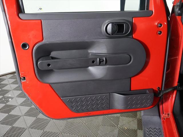 Photo of 2010 Flame Red Clearcoat Jeep Wrangler Unlimited