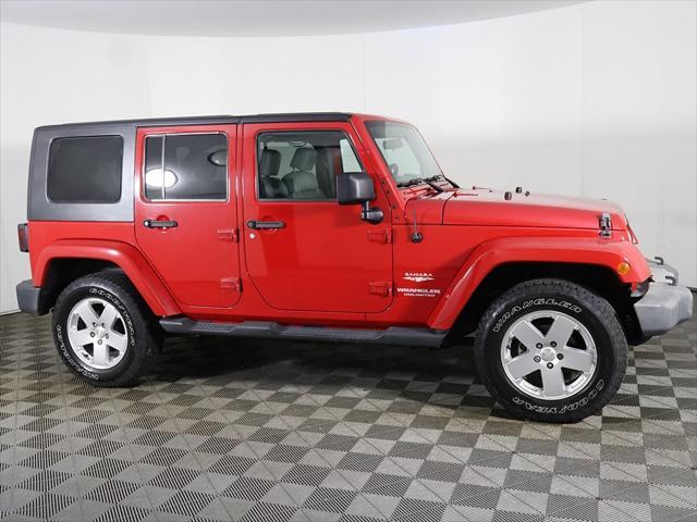 Photo of 2010 Flame Red Clearcoat Jeep Wrangler Unlimited