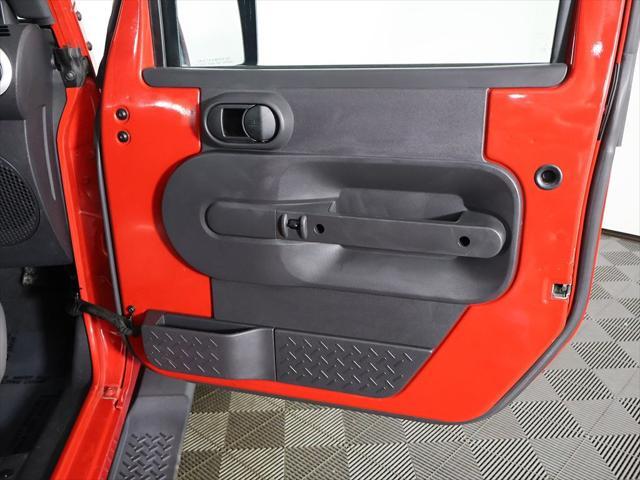 Photo of 2010 Flame Red Clearcoat Jeep Wrangler Unlimited