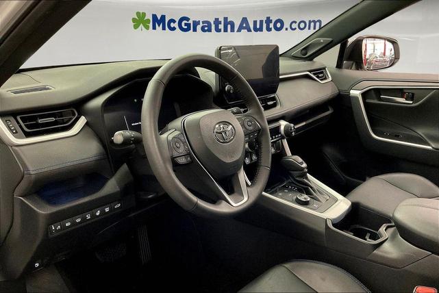 Photo of 2023 White Toyota RAV4 Hybrid