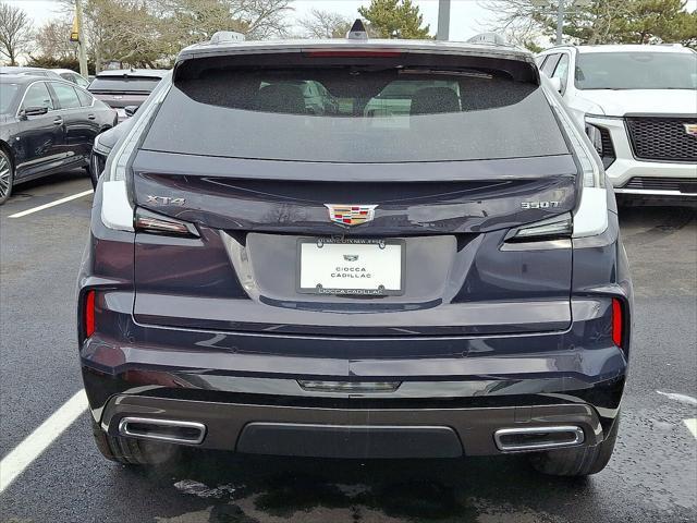 Photo of 2025 Midnight Sky Metallic Cadillac XT4