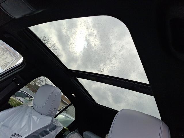 Photo of 2025 Midnight Sky Metallic Cadillac XT4
