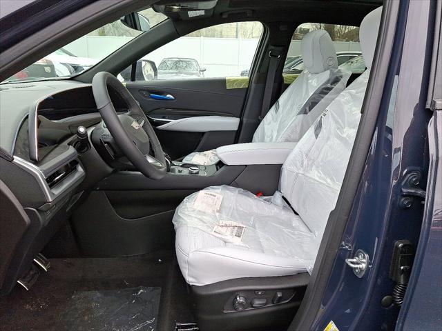 Photo of 2025 Midnight Sky Metallic Cadillac XT4