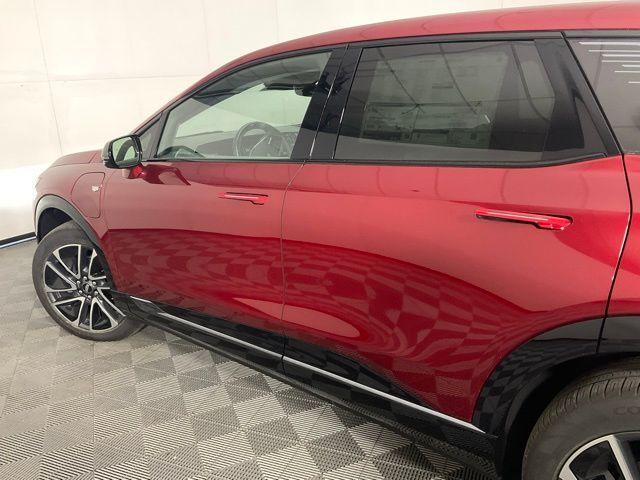 Photo of 2025 Radiant Red Cadillac OPTIQ
