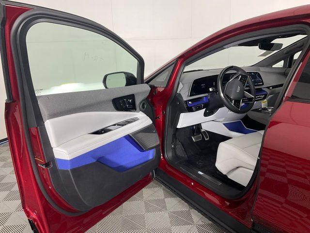 Photo of 2025 Radiant Red Cadillac OPTIQ