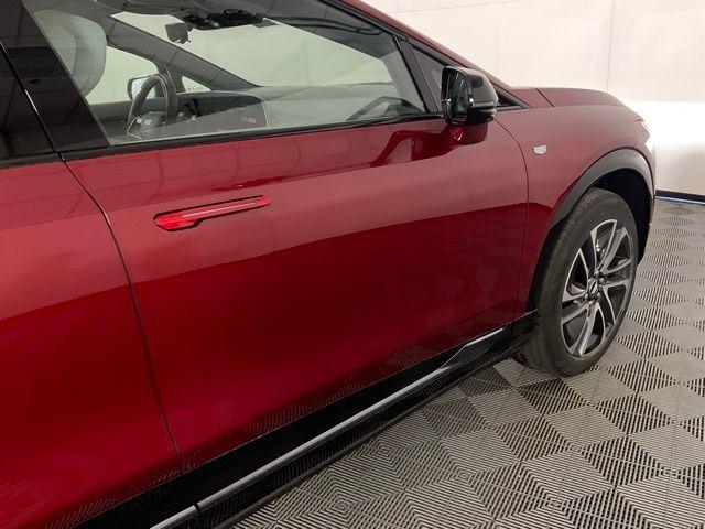 Photo of 2025 Radiant Red Cadillac OPTIQ