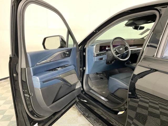 Photo of 2025 Black Raven Cadillac Escalade IQ