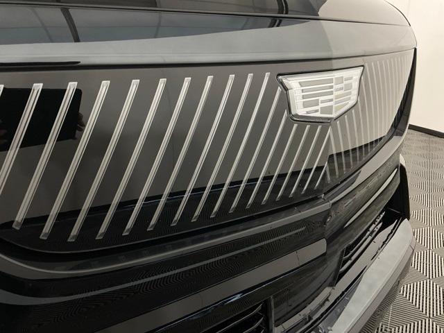Photo of 2025 Black Raven Cadillac Escalade IQ