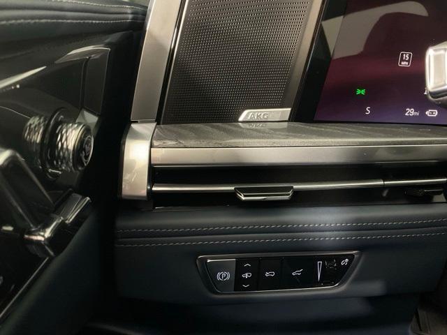 Photo of 2025 Black Raven Cadillac Escalade IQ