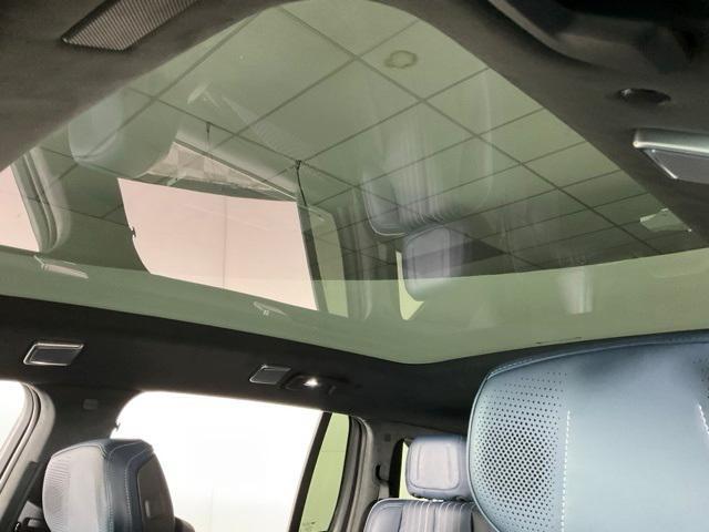 Photo of 2025 Black Raven Cadillac Escalade IQ