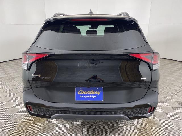 Photo of 2025 Ebony Black Kia Sportage