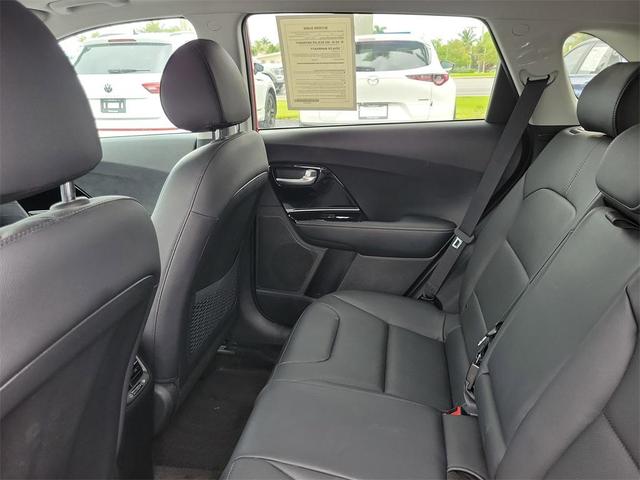 Photo of 2022 Solar Orange Kia Niro