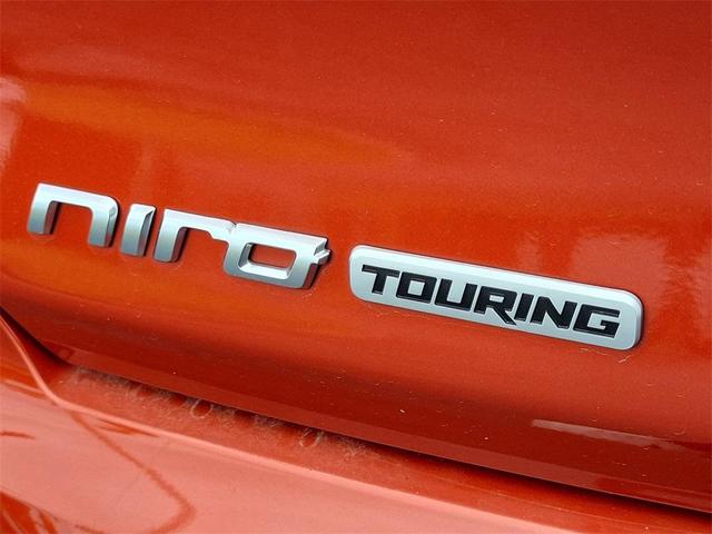Photo of 2022 Solar Orange Kia Niro