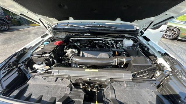 Photo of 2024 Glacier White Nissan Frontier