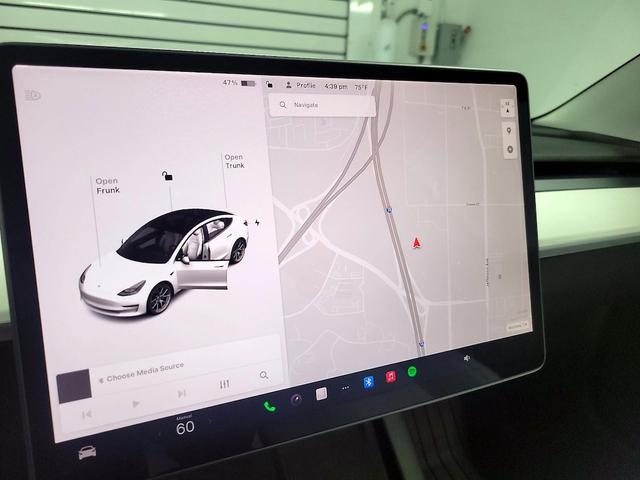 Photo of 2021 White Tesla Model 3