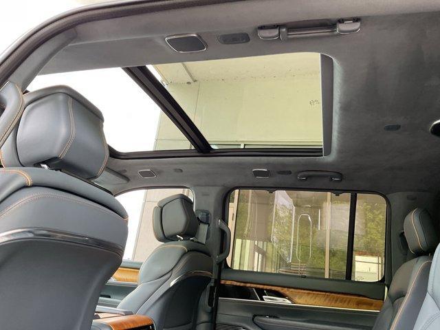 Photo of 2022 Bright White Clearcoat Jeep Grand Wagoneer