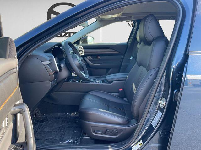 Photo of 2025 Blue Metallic Mazda CX-50 Hybrid