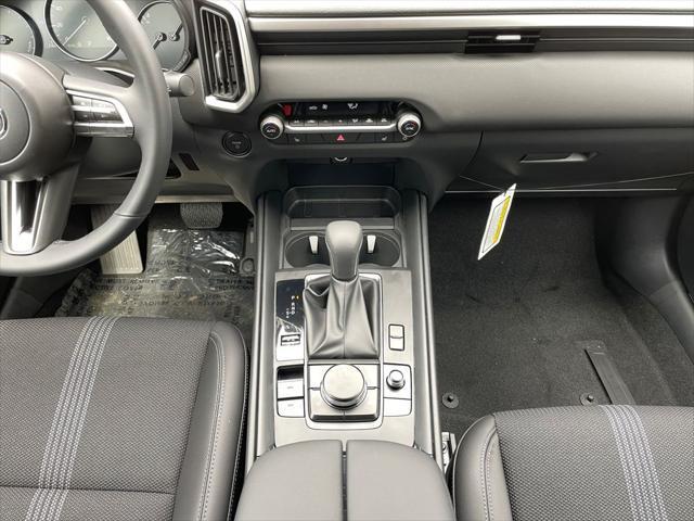 Photo of 2025 Wind Chill Pearl Mazda CX-50 Hybrid
