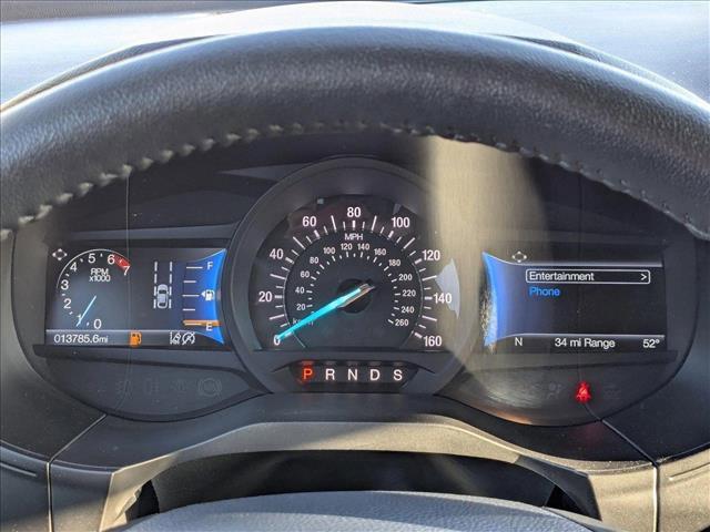 Photo of 2024 Agate Black Metallic Ford Edge