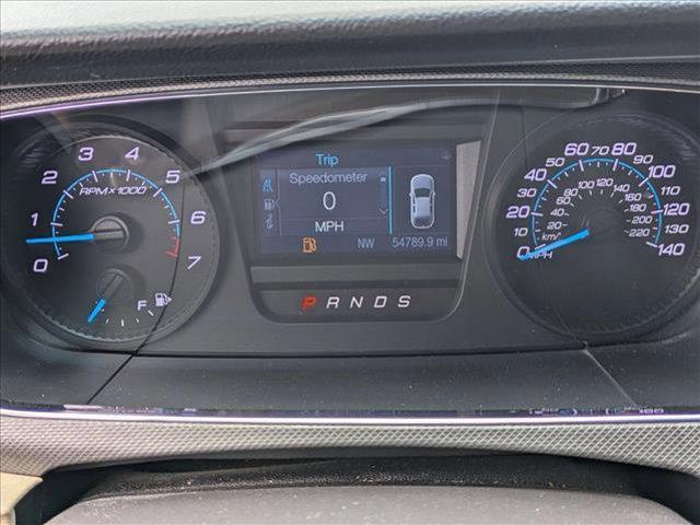 Photo of 2018 White Gold Metallic Ford Taurus