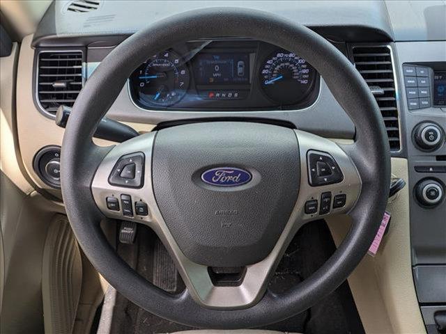 Photo of 2018 White Gold Metallic Ford Taurus